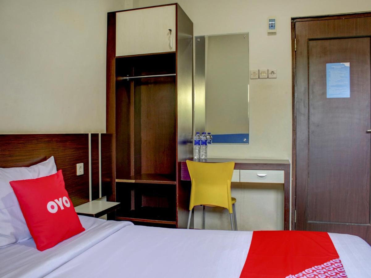Oyo 90162 Remboelan Guest House Sungai Lutus Exterior foto